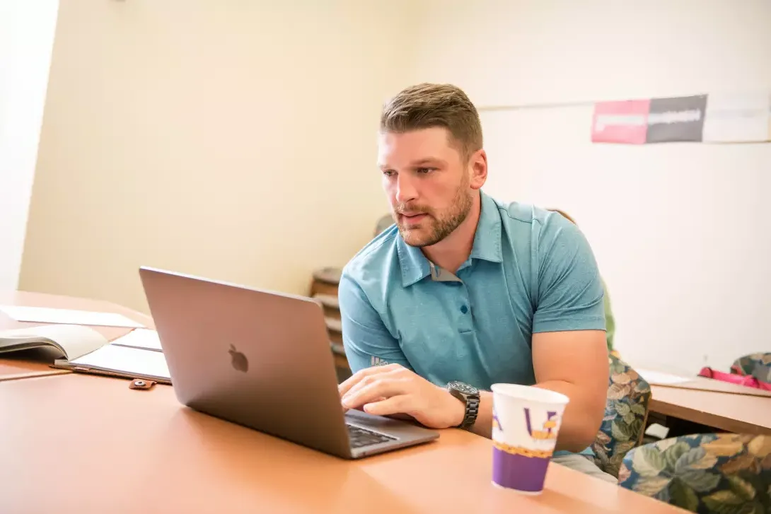 Student in classroom on computer